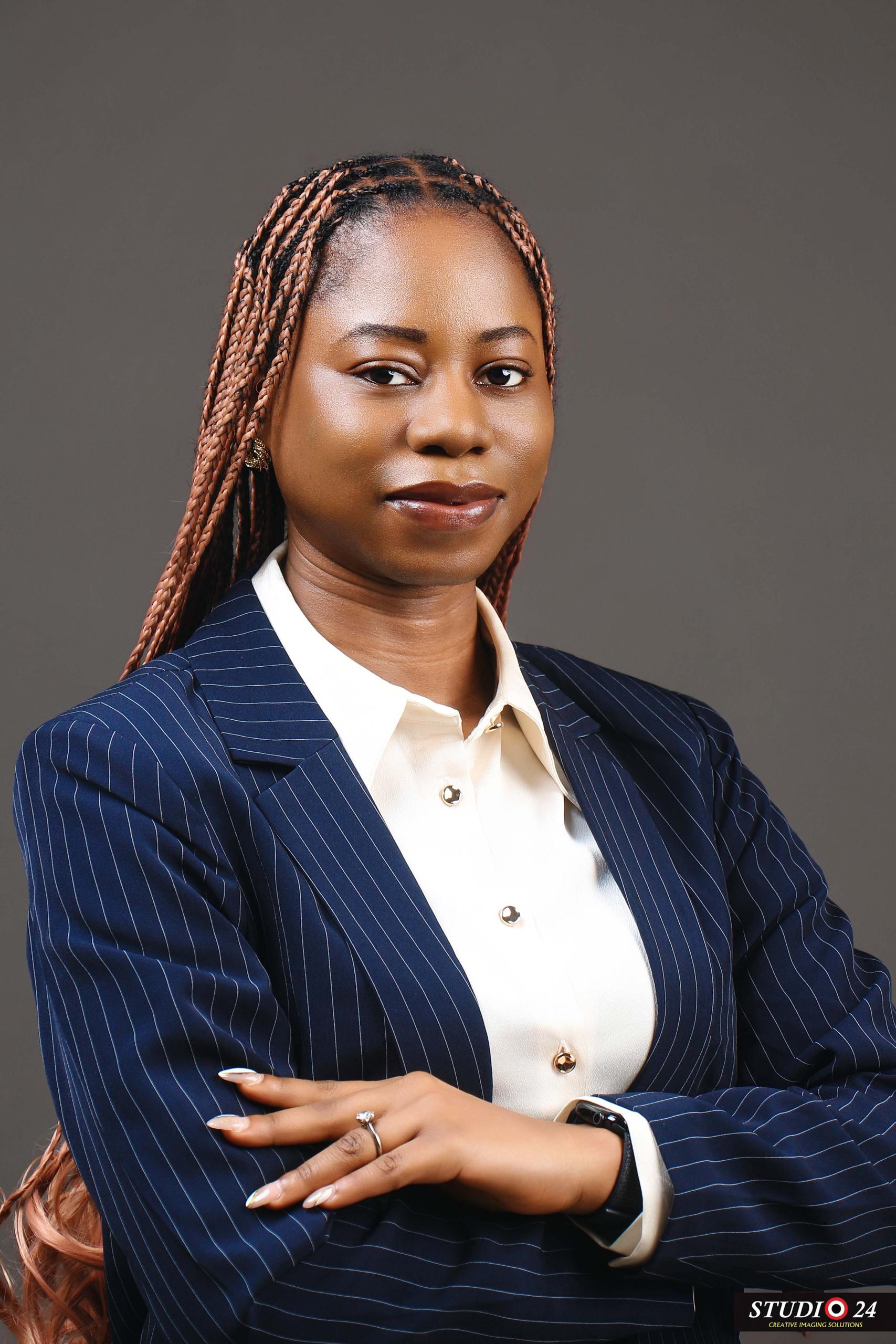 A image of a concrete sphere, balanced between two other larger spheres